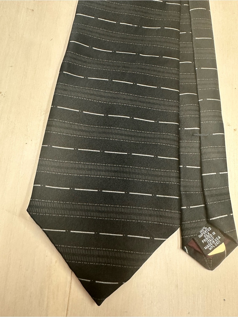 Men's Black Patterned Necktie with Subtle Gray Dash Lines